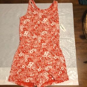 Reddish orange romper with flowers